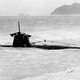 The Japanese mini submarine HA-19 (similar to the mini sub sunk by the USS Ward), which washed ashore on December 8, 1941. (Image: Naval History and Heritage Command)